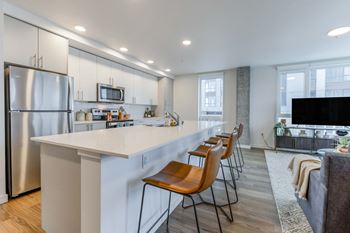 Fully equipped kitchens with stainless steel appliances at Riverfront Everett, Everett